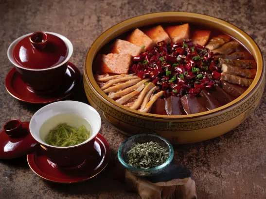 Mengding Ganlu Tea with Stewed Assorted Meat and Seafood in Chili Broth